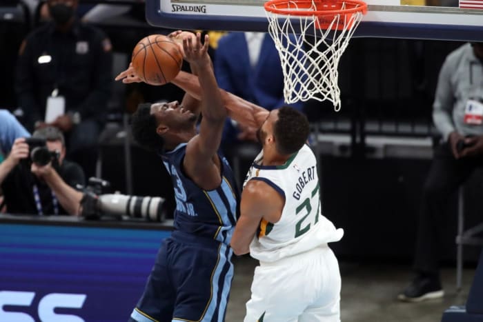 Rudy Gobert (27) blocks a shot from Jaren Jackson Jr (13)